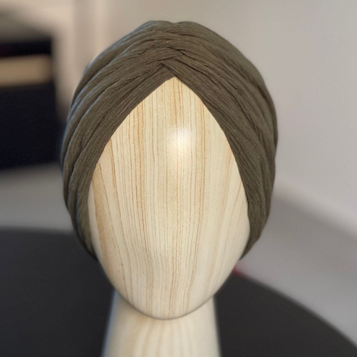 Rucha in dusty olive pleats