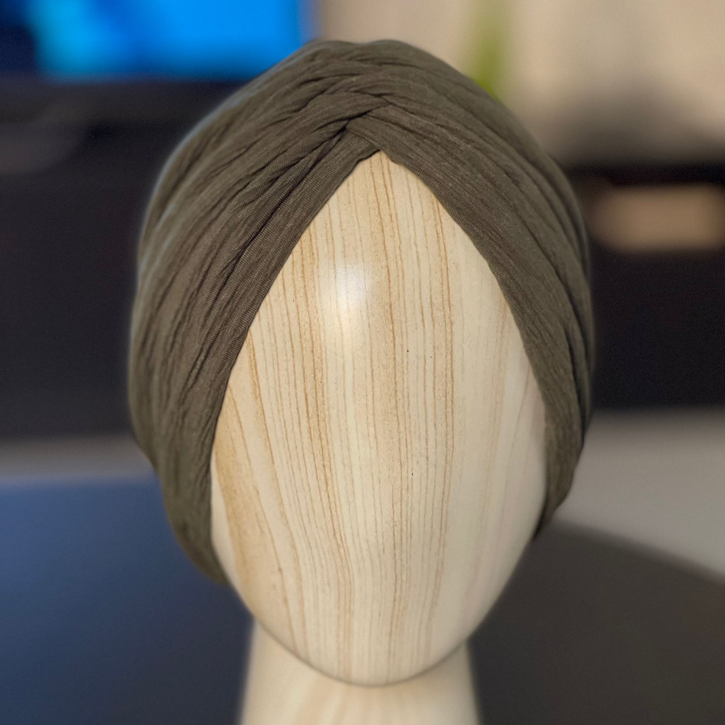 Rucha in dusty olive pleats
